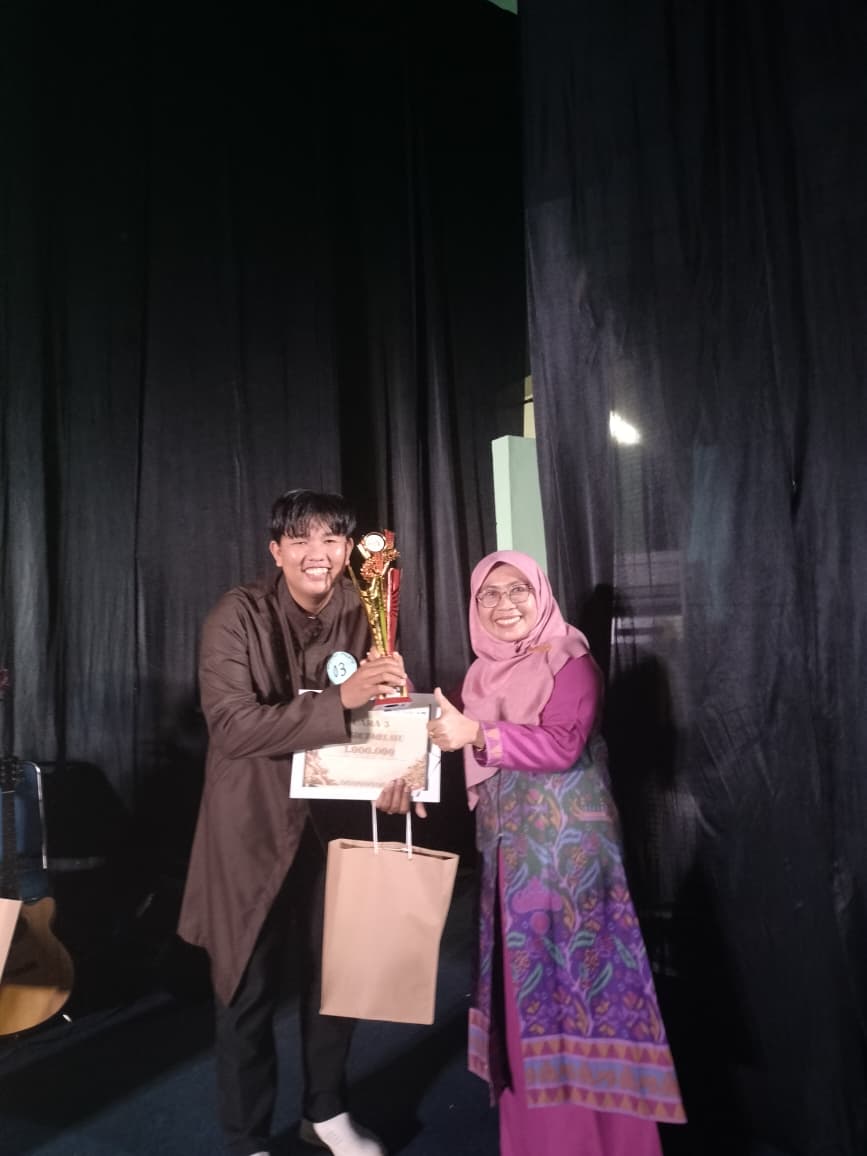Gemilang di Sutha Voice VI: Mahasiswa Prodi SPI Raih Juara Dangdut Melayu
